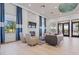 Inviting lounge area with fireplace, comfortable seating, and stylish decor at 5770 Long Shore Loop, Sarasota, FL 34238