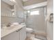 Full bathroom featuring a shower with a glass enclosure and white vanity at 603 Cedars Ct, Longboat Key, FL 34228