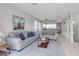 Spacious living room with comfortable seating and open access to the kitchen at 603 Cedars Ct, Longboat Key, FL 34228