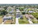 Desirable location: single-Gathering home featuring well-kept landscaping nestled in a friendly neighborhood setting at 6146 Grandeur St, Englewood, FL 34224