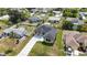 View of single-story home situated on a lot in a residential neighborhood at 6146 Grandeur St, Englewood, FL 34224