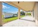 View of a covered patio showing the outdoor space at 6146 Grandeur St, Englewood, FL 34224
