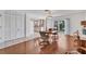 Open dining room with hardwood floors and access to the kitchen at 6701 12Th W Ave, Bradenton, FL 34209