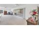 Large living room with sliding glass doors to the screened-in lanai at 6701 12Th W Ave, Bradenton, FL 34209