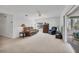 Bright living room with neutral carpet and a cozy brown sofa at 6701 12Th W Ave, Bradenton, FL 34209