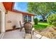 Relaxing patio area featuring comfortable chairs and a well-maintained garden, perfect for enjoying the outdoors at 6701 12Th W Ave, Bradenton, FL 34209