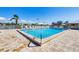 Enjoy the community pool with plenty of deck space and a clear view of the surrounding palm trees at 6701 12Th W Ave, Bradenton, FL 34209