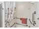 Accessible shower with safety bars and attractive shower curtain at 6701 12Th W Ave, Bradenton, FL 34209