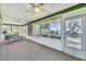 Sunroom with large windows and seating area at 6701 12Th W Ave, Bradenton, FL 34209