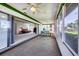 Spacious sunroom with sliding glass doors and scenic views at 6701 12Th W Ave, Bradenton, FL 34209