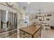 Bright kitchen featuring stainless steel appliances, custom cabinets, and a stylish kitchen island at 6766 Beedla St, North Port, FL 34291