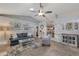 Open living room featuring stylish furnishings, neutral decor, and wood-look flooring at 6766 Beedla St, North Port, FL 34291
