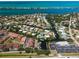 Beautiful waterfront homes nestled along canals with serene ocean views define this coastal community from above at 709 Sorrento Inlt # 709, Nokomis, FL 34275