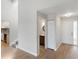 Inviting entryway with half bathroom and stairway leads to the kitchen and upper level at 709 Sorrento Inlt # 709, Nokomis, FL 34275