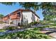 Exterior view of a townhome with a charming balcony and well-maintained lawn at 709 Sorrento Inlt # 709, Nokomis, FL 34275