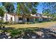 Exterior of townhomes with well-maintained lawn and landscaping at 709 Sorrento Inlt # 709, Nokomis, FL 34275