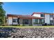 Beautiful house exterior view featuring tile roof, bright stucco walls and a nice glass enclosed patio at 709 Sorrento Inlt # 709, Nokomis, FL 34275