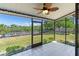 Screened lanai overlooking the backyard and waterway, perfect for outdoor relaxation at 709 Sorrento Inlt # 709, Nokomis, FL 34275