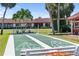 Enjoy the community's shuffleboard courts in a beautifully landscaped setting at 709 Sorrento Inlt # 709, Nokomis, FL 34275