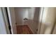 Walk-in closet featuring wood flooring, wire shelving, and ample storage space at 7102 52Nd E Dr, Bradenton, FL 34203