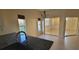Kitchen with stainless steel appliances, tile floors, a sink with a view, and plenty of counter space at 7102 52Nd E Dr, Bradenton, FL 34203