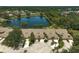 Beautiful aerial view of lakeside villas with lush landscaping and mature trees at 7118 Lakeside Dr # 7118, Sarasota, FL 34243