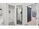 Bright bathroom featuring a glass shower, modern toilet room, and stylish vanities with modern fixtures at 7118 Lakeside Dr # 7118, Sarasota, FL 34243