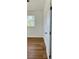 Bedroom with window and wood floors at 8412 Grove Blvd, Punta Gorda, FL 33982