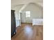 Bonus room features wood-look floors, a window, a door, and a countertop at 8412 Grove Blvd, Punta Gorda, FL 33982