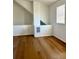 Upstairs bonus room with wood-look flooring is bright and open at 8412 Grove Blvd, Punta Gorda, FL 33982