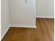 A corner with white trim and wood floors is shown at 8412 Grove Blvd, Punta Gorda, FL 33982