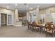 Community clubhouse area with seating, bar, and coffee station at 8926 Manor Loop # 201, Lakewood Ranch, FL 34202