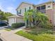 Charming two-story townhome with attached garage and lush landscaping at 8926 Manor Loop # 201, Lakewood Ranch, FL 34202