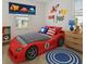 Themed bedroom with playful decorations, including a car-shaped bed, rocket, and race car accents at 9064 Driven Snow St, Sarasota, FL 34241