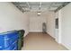Clean two car garage with epoxy floor and water heater at 9064 Driven Snow St, Sarasota, FL 34241