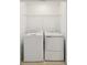 Convenient laundry closet featuring a new washer and dryer at 9064 Driven Snow St, Sarasota, FL 34241