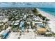 Wonderful aerial view showcasing the charming coastal town near the beach at 104 Magnolia Ave, Anna Maria, FL 34216