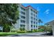 Exterior view of a well-maintained condominium building with a clean and appealing design at 1100 Imperial Dr # 507, Sarasota, FL 34236