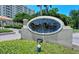 Entrance sign for Bay's Bluff community with lush landscaping and well-maintained grounds at 1100 Imperial Dr # 507, Sarasota, FL 34236