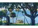 Scenic view of the bay framed by mature trees offers a serene and tranquil atmosphere at 1100 Imperial Dr # 507, Sarasota, FL 34236