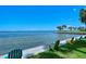Enjoy the waterfront views from the comfort of the community lawn with colorful Adirondack chairs at 1100 Imperial Dr # 507, Sarasota, FL 34236