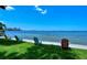 Relax on the lawn with colorful chairs and enjoy the amazing waterfront views at 1100 Imperial Dr # 507, Sarasota, FL 34236