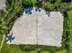 Aerial shot of the sand volleyball court at the community center at 12712 Dusty Trail Dr, Sarasota, FL 34238