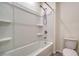 Bathroom featuring shower and tub combo with a white surround at 12728 Lateral Root Dr, Sarasota, FL 34238