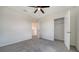 Neutral bedroom with a view to the closet and en-suite bathroom at 12728 Lateral Root Dr, Sarasota, FL 34238
