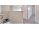 Second-floor hallway featuring carpet flooring at 12728 Lateral Root Dr, Sarasota, FL 34238