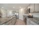 Modern kitchen featuring stainless steel appliances and granite countertops at 12728 Lateral Root Dr, Sarasota, FL 34238