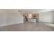 Spacious kitchen area featuring an island, stainless steel appliances, ample counter space, and open layout at 12728 Lateral Root Dr, Sarasota, FL 34238