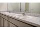 Double vanity bathroom with dual sinks and granite countertops at 12732 Lateral Root Dr, Sarasota, FL 34238