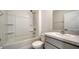 Clean bathroom features a shower-tub combo and vanity with ample countertop space at 12732 Lateral Root Dr, Sarasota, FL 34238